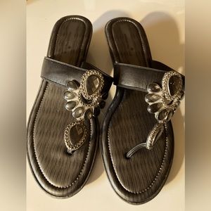 Small black wedge sandal.